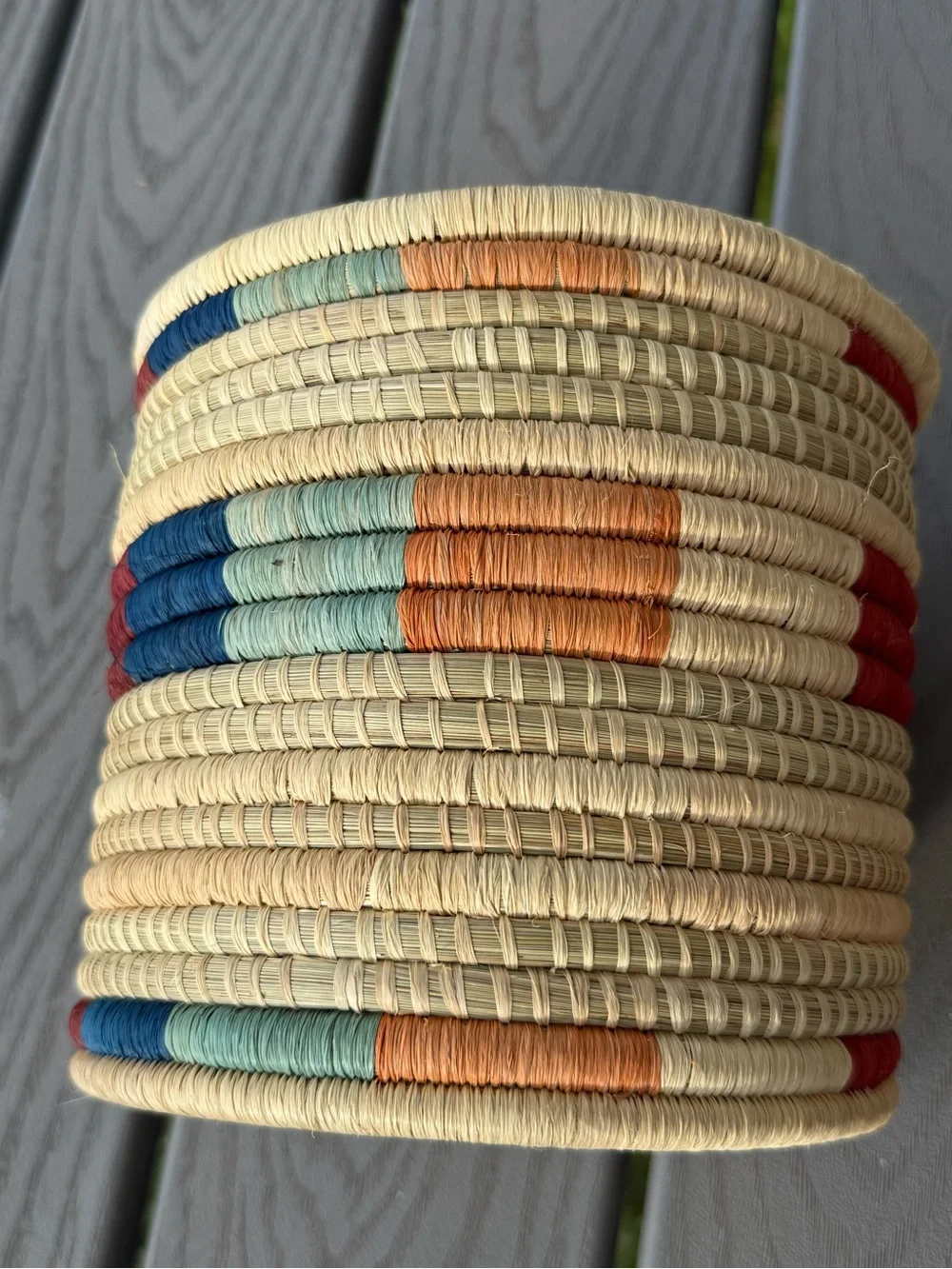 Handwoven Natural Basket with Red and Blue Accents